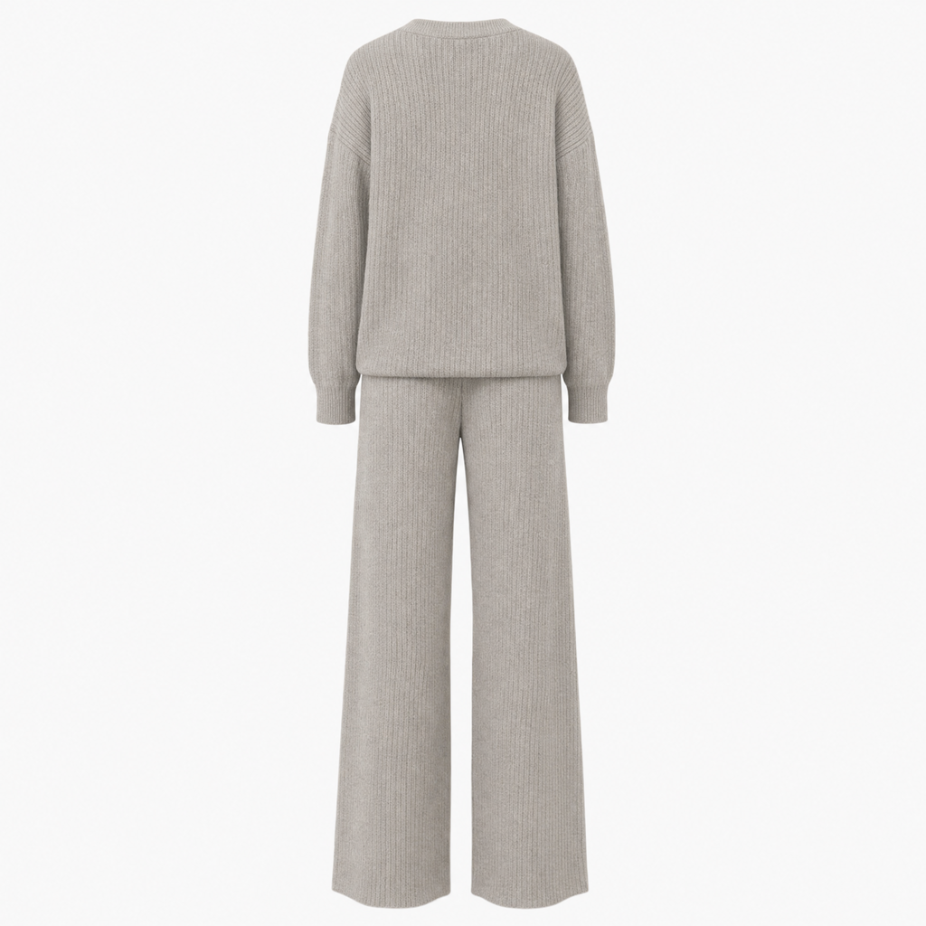 A light gray ribbed knit two-piece set featuring a long-sleeve crewneck sweater and matching wide-leg trousers, shown on a plain white background.
